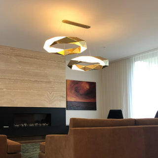 Modern room with two geometric pendant lights.
