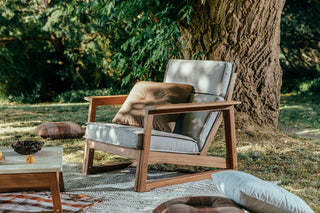 Didier TanGuor outdoor chair with cushions in garden