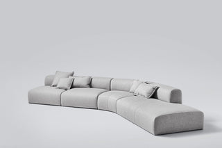 Modern gray sectional sofa with pillows