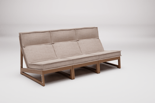 Beige three-seat sofa with wooden frame.
