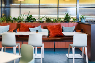 Restaurant seating area with colorful pillows, 7T5A3518-copy