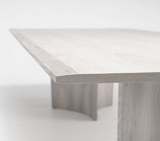 Wooden table with a rectangular top and two legs.