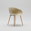Beige chair with wooden legs on a white background