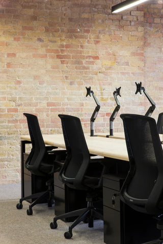 Advanta Aveya Task chairs in black frame, in-situ office