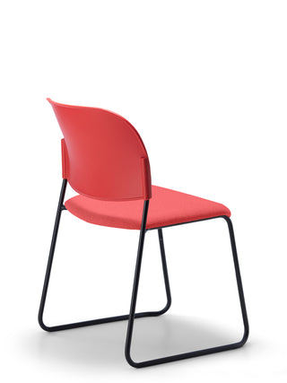 Advanta_Lumia-81 red chair with black metal legs on a white background
