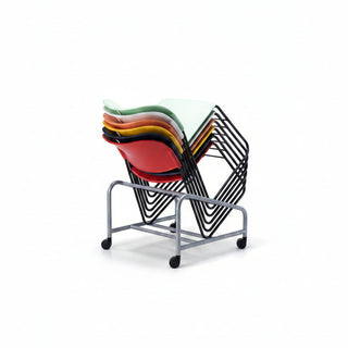 Stacked colorful chairs on a rolling cart