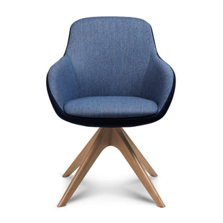 Blue upholstered chair with wooden legs on a white background