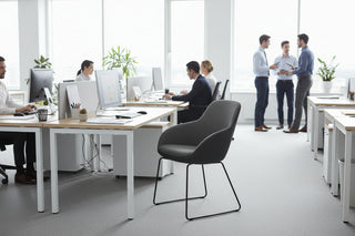 Modern chair with gray upholstered seat and black metal frame on a white background