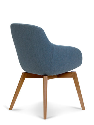 Blue upholstered chair with wooden legs on a white background