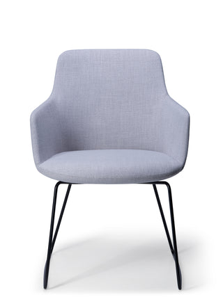 Gray upholstered chair with black metal legs on a white background