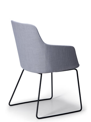 Gray upholstered chair with black metal legs on a white background