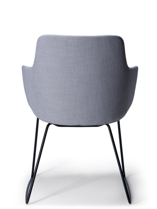 Light gray chair with metal legs on a white background