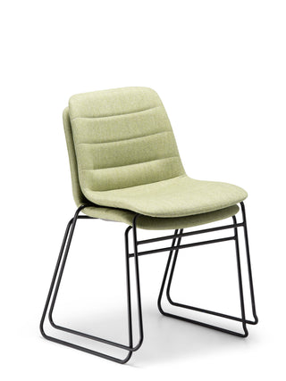 Stacked Nu Soul green chairs with black metal legs on a white background