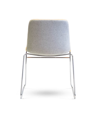 Nu Soul chair with gray cushioned seat and metal legs on a white background