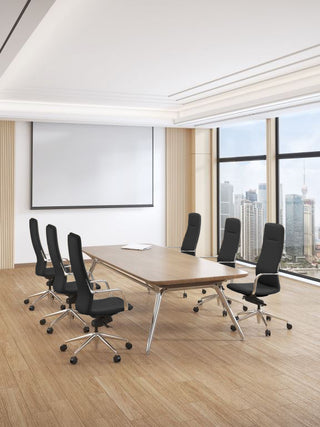 Modern conference room with a large wooden table and Million high back black chairs, featuring a cityscape view.