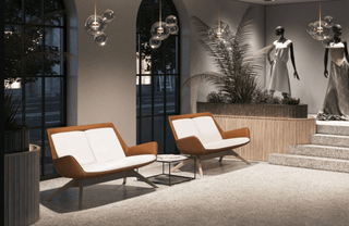 Aquila2 Loungelowback sofas in luxury retail space.