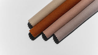 Atlas fabric samples in various colors