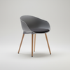 Modern chair with gray seat and backrest and wooden legs on a white background