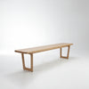 Wooden bench with a minimalist design on a white background