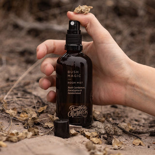 Bush Magic Room Mist bottle held in hand