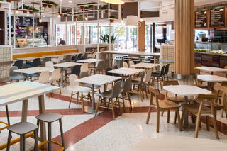 Caterpillar tables in modern cafe