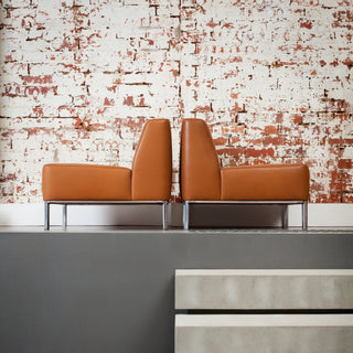 Connected sofa 2 in brown leather against brick wall