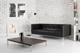 Black leather sofa and coffee table in modern living room