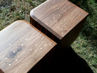 Wooden side tables with inlaid dots
