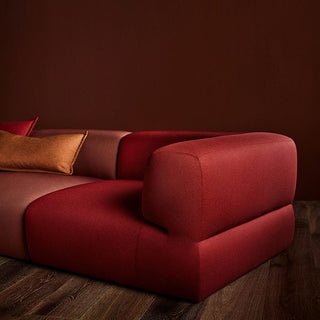 Corner sofa in red shades