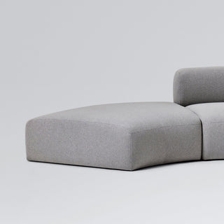 Curved gray ottoman