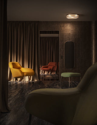 yellow and red chairs in a dimly lit room.