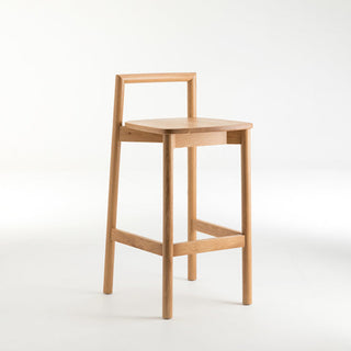 Wooden bar stool on a white background