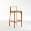 Wooden bar stool on a white background