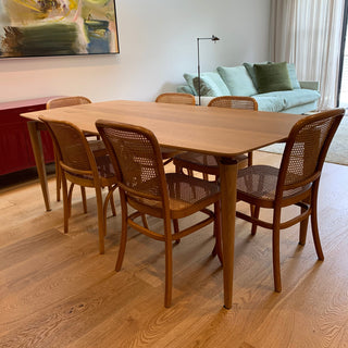 Dusan's dining room with wooden table and chairs