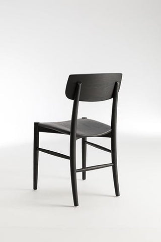 Black chair from Etiquette Collection