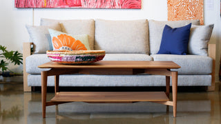 Sofa with coffee table, artwork, and decorative pillows - I3A3253
