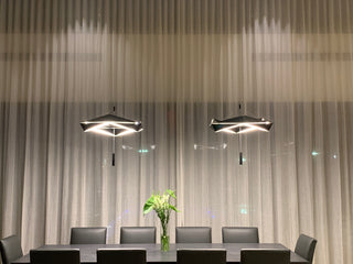 Modern dining room with pendant lights