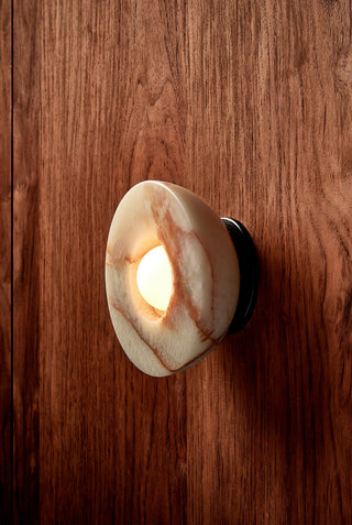 Marz Designs Aurelia Onyx Sconce on wood wall