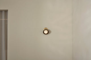Marz Designs Terra 0 articulating brass wall light