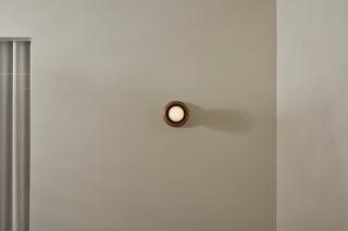 Marz Designs Terra 00 Surface Sconce in Clay and Walnut, on wall