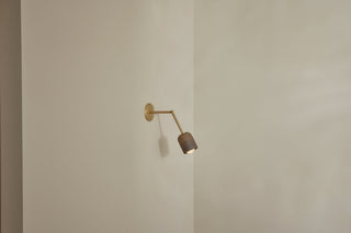 Marz Designs Terra-1 articulating clay and brass wall sconce.