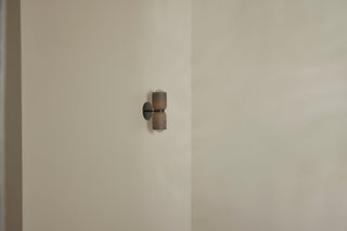 Marz Designs Terra 2 wall light in clay and brushed black.