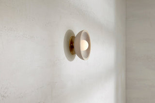 Marz Designs Selene sconce in bleached ash and brass, side view.