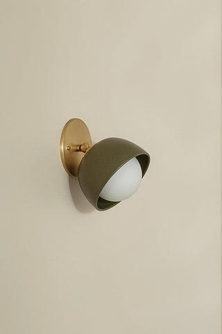 Olive and brass articulating wall sconce