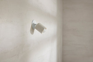 Marz Designs Terra 1 articulating wall light, vanilla bean, side view.