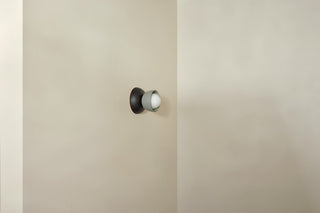 Marz Designs Terra Sconce, Fog Blackened Ash, mounted on wall