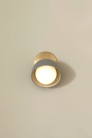 Marz Designs Terra wall sconce in brass and opal