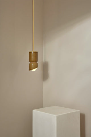 Marz Designs Terra 1.5 Pendant in Chartreuse Brass with white frosted light.