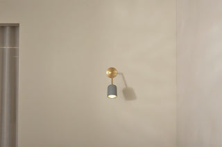 Marz Designs Terra 1 articulating fog brass wall sconce
