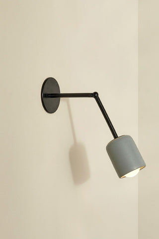 Marz Designs Terra 1 articulating wall lamp in brushed black.